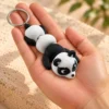 3d-tistena-klicenka-mini-panda-ruka Klíčenka Mini Panda